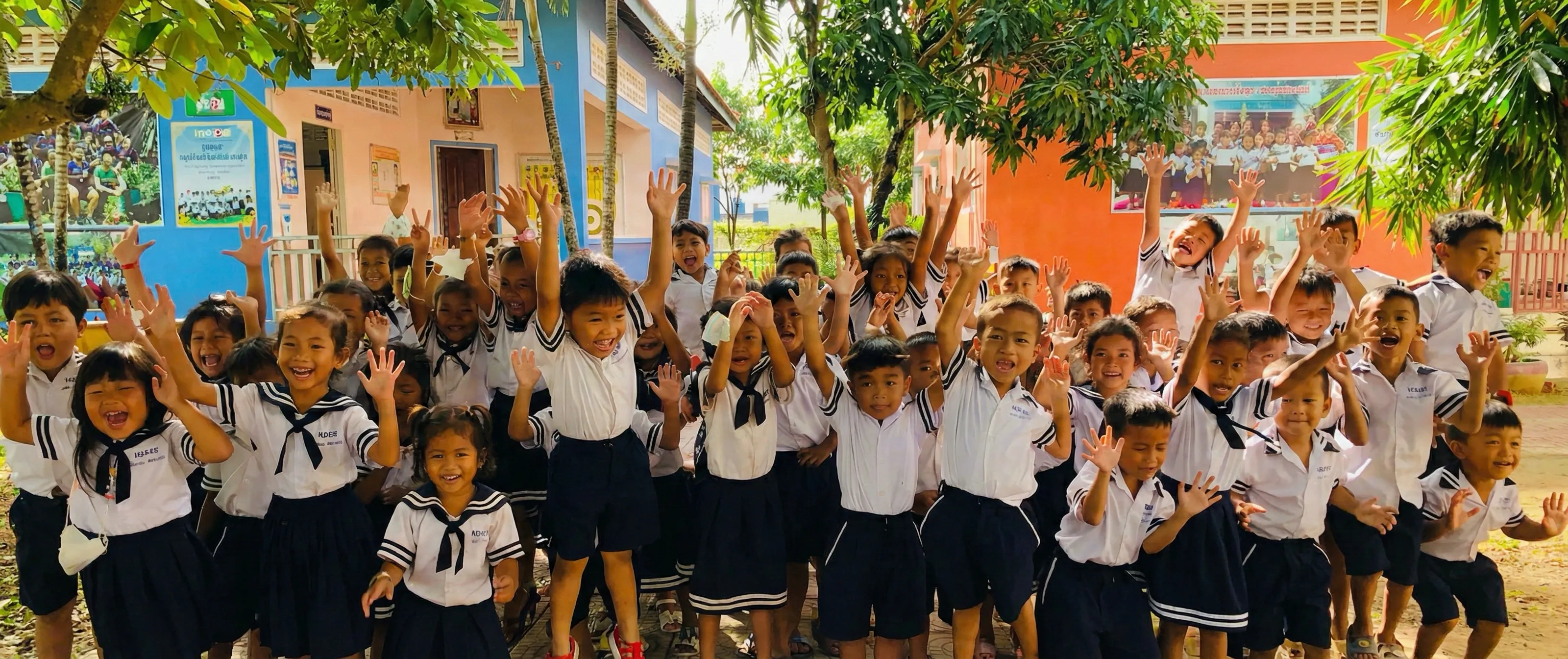 Children smiling and learning in Cambodia